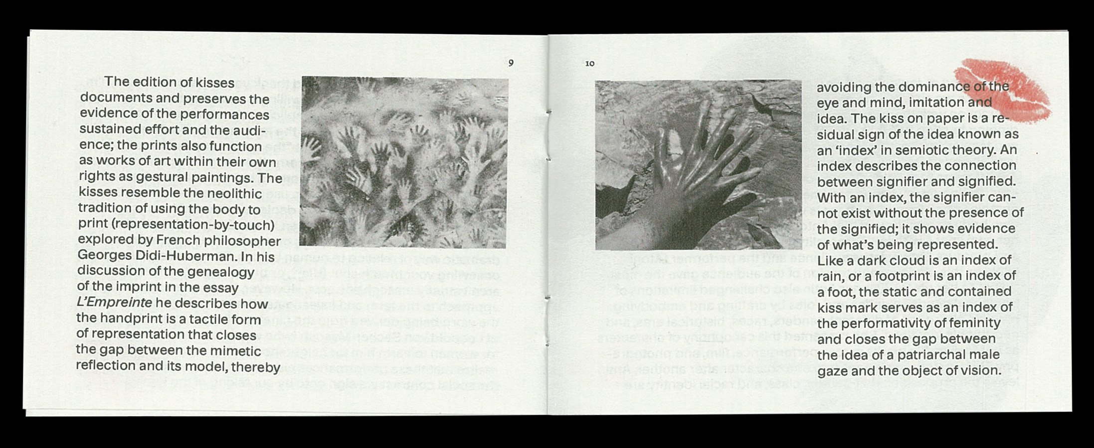 second page of A Ranic Kissing Floor zine, featuring a black and white image of a prehistoric cave drawing of hands on the left and the hypothesized spraying process to create them on the right. The pages feature black text printed on cool grey paper with a transparent kiss in red printed over the text on the right page.