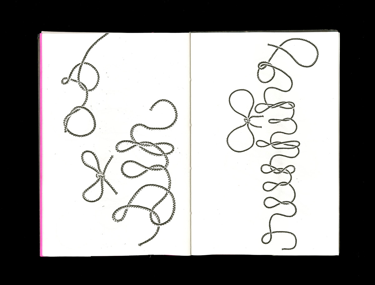 open book spread displaying the word 'as sin' and 'runnin' in a typeface made of rope on the left and right pages, respectively, on a white paper